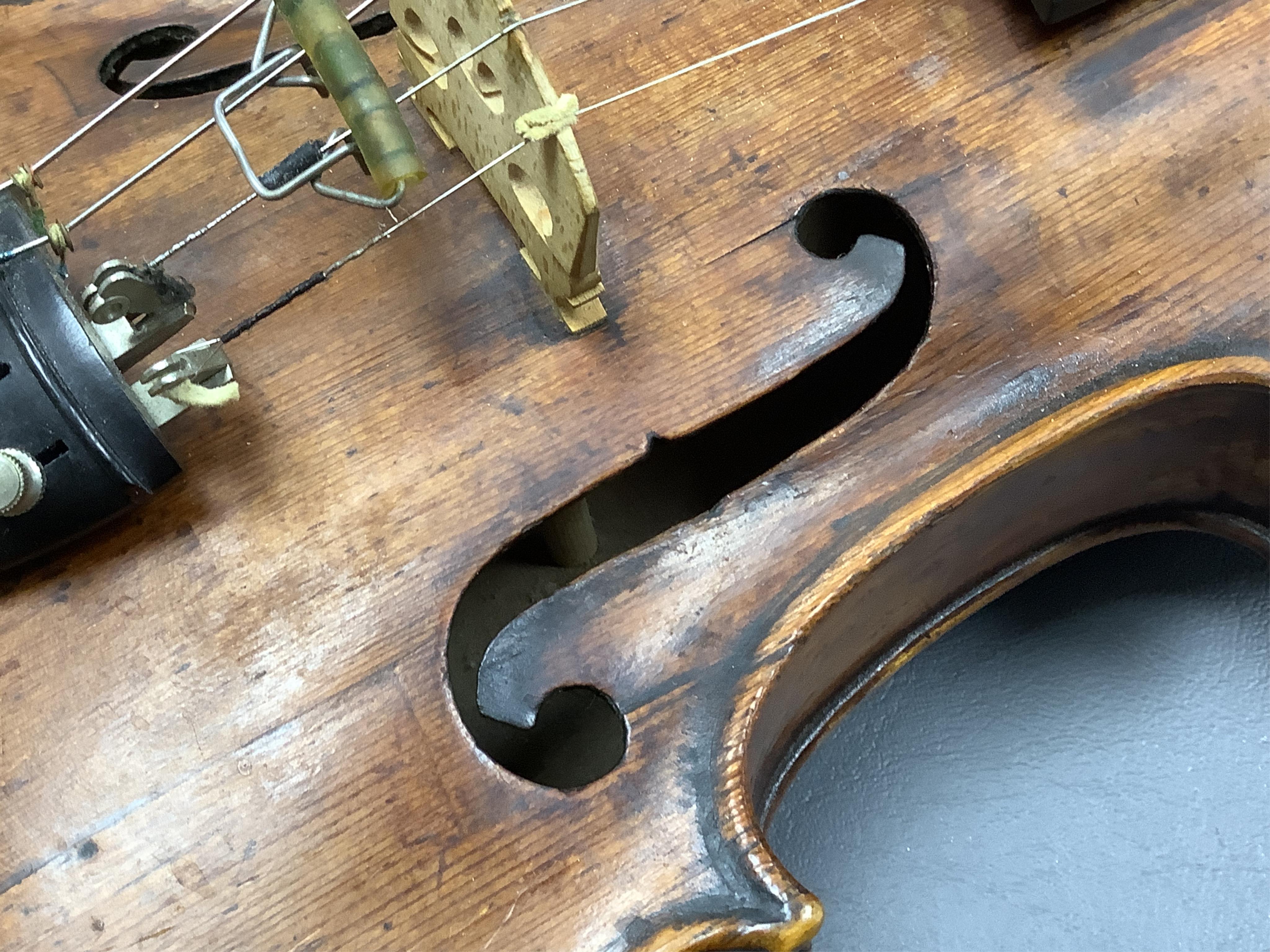 An interesting late 18th century violin, with one piece bird’s eye maple back, unsigned, with two silver fully mounted octagonal bows, one stamped Voight CITES Submission reference, 3XFNUBT7 and Submission reference, RHL